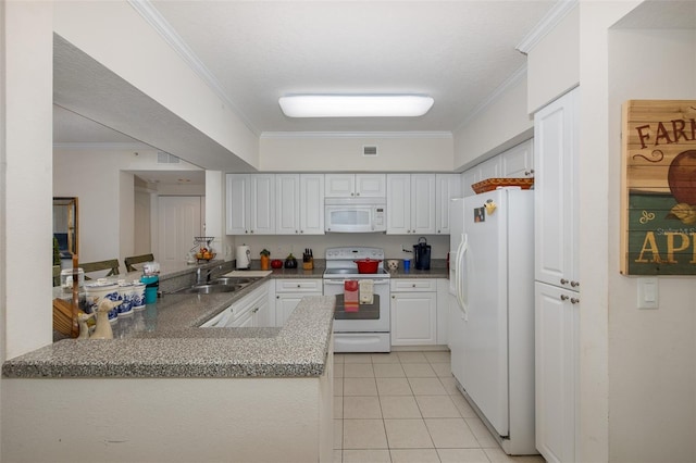 kitchen with white cabinetry, sink, kitchen peninsula, white appliances, and ornamental molding