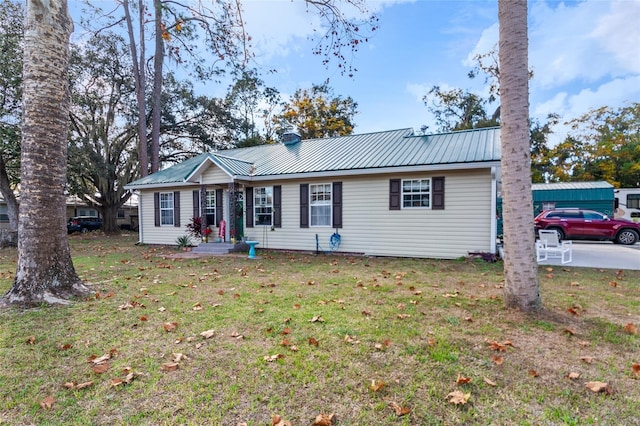 ranch-style house with a front yard