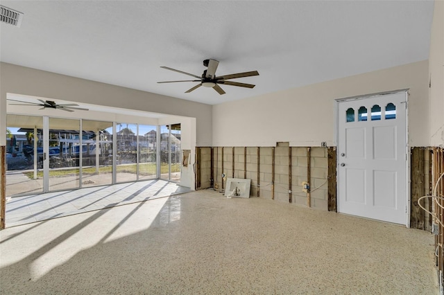 unfurnished room featuring ceiling fan