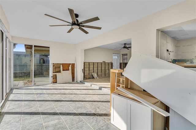 interior space featuring ceiling fan