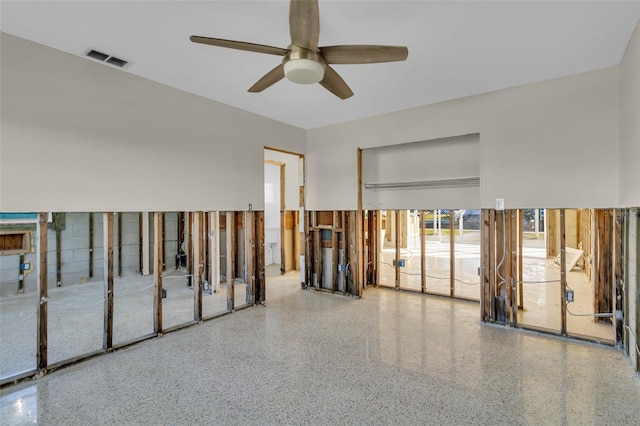 interior space featuring ceiling fan