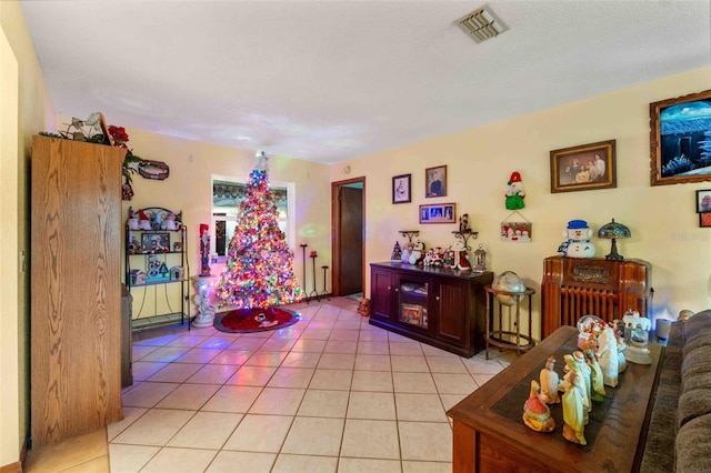 living room with light tile patterned floors