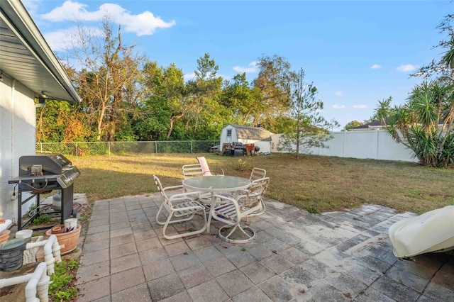 view of patio with a shed