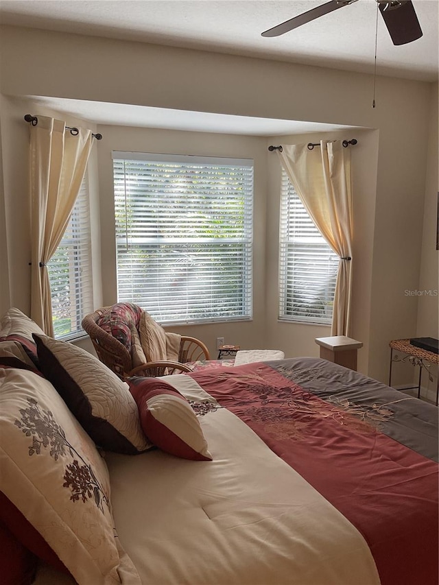 bedroom featuring ceiling fan