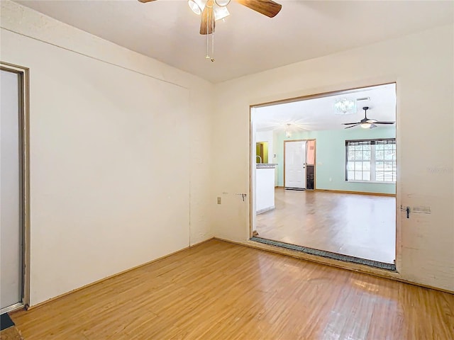 unfurnished room featuring hardwood / wood-style floors