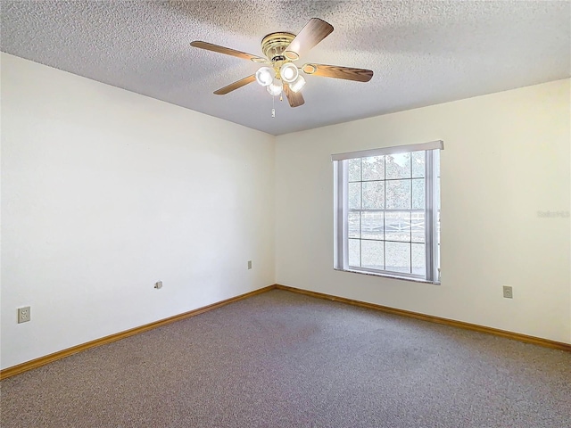 unfurnished room featuring carpet flooring, a textured ceiling, and ceiling fan