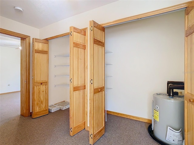 closet with a wall mounted AC and water heater