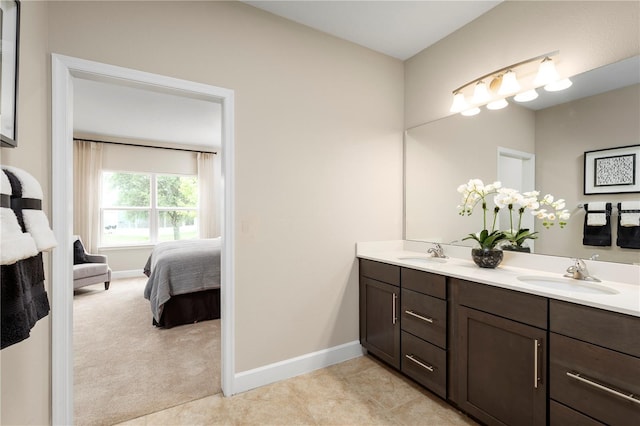 bathroom with vanity and tile patterned floors