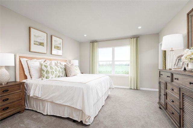 bedroom with light colored carpet