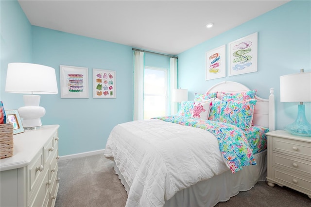 bedroom featuring dark carpet