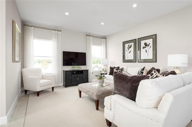 tiled living room with a wealth of natural light