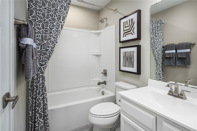 full bathroom with shower / bath combo, vanity, and toilet