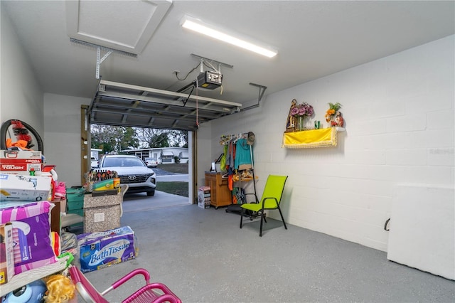 garage featuring a garage door opener