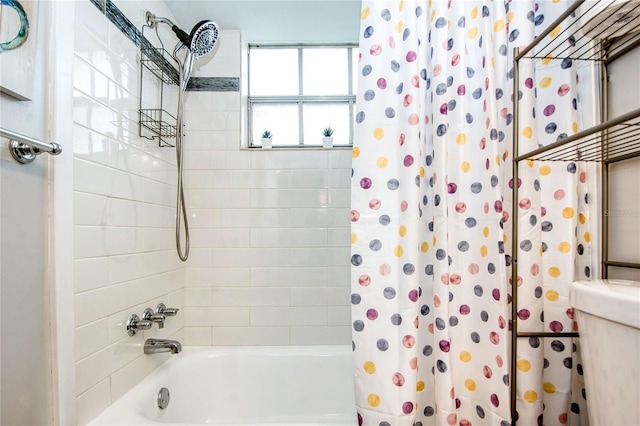 bathroom featuring shower / bath combination with curtain