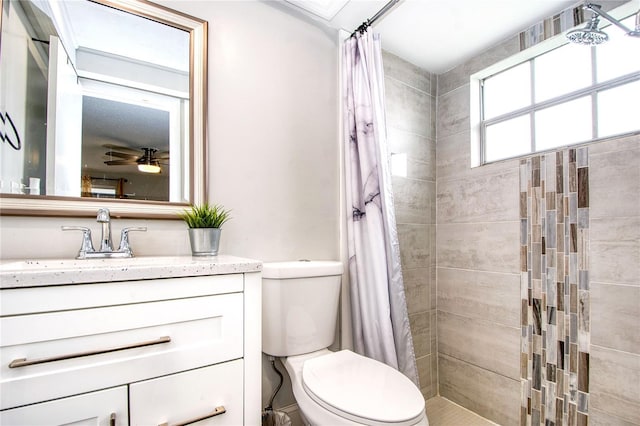 bathroom featuring walk in shower, vanity, and toilet