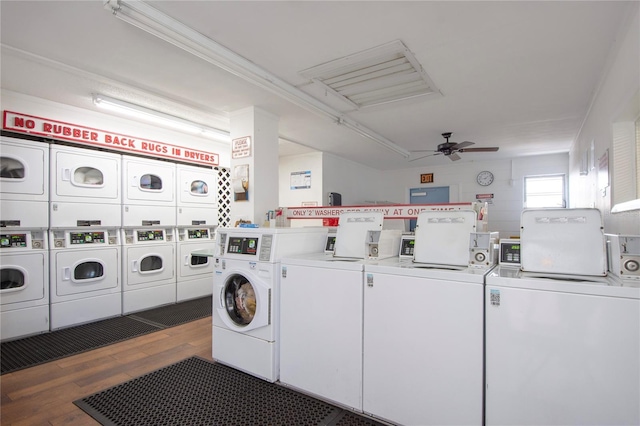 laundry area featuring dark wood-type flooring, crown molding, washer and dryer, ceiling fan, and stacked washer / dryer