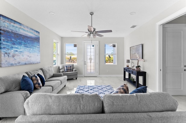 living room with ceiling fan