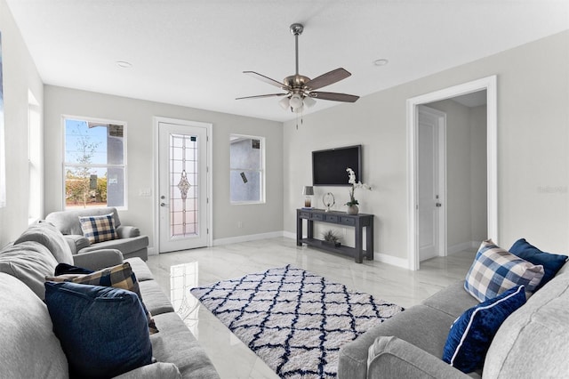 living room with ceiling fan