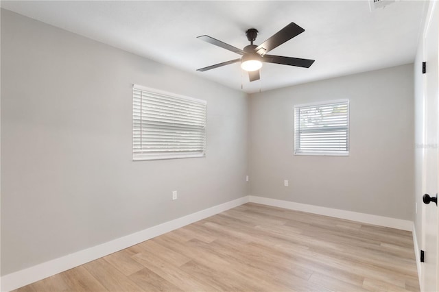 unfurnished room featuring ceiling fan and light hardwood / wood-style flooring