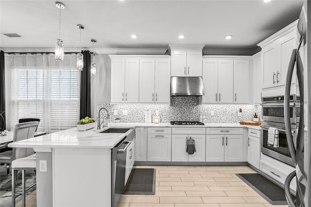 kitchen with white cabinets and pendant lighting