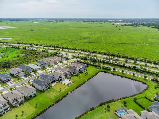 aerial view featuring a water view and a rural view