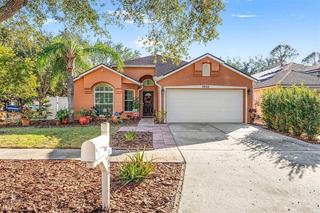 view of front of property featuring a garage