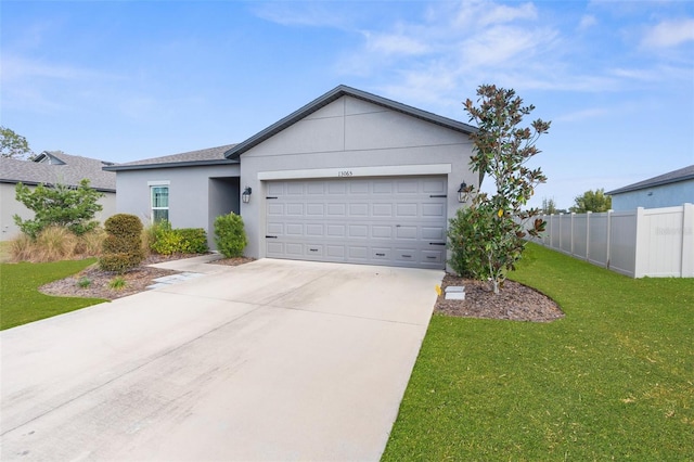 ranch-style home with a front yard and a garage