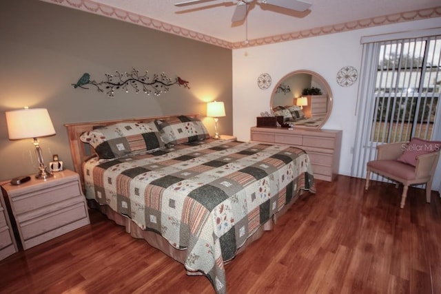 bedroom featuring a ceiling fan and wood finished floors