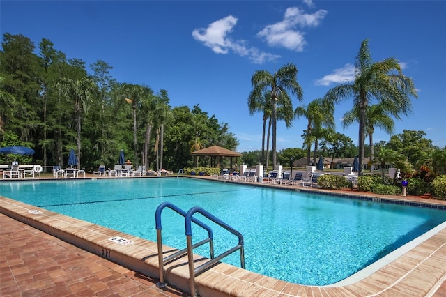 community pool featuring a patio area