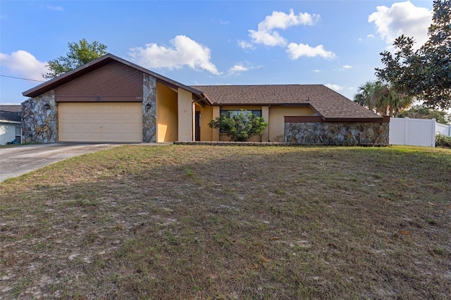 ranch-style house with a front lawn and a garage