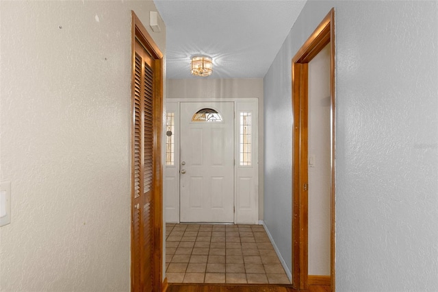 doorway with hardwood / wood-style flooring