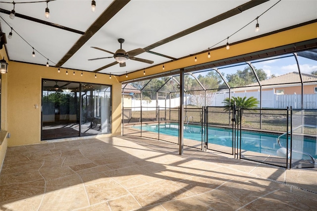 view of swimming pool featuring ceiling fan