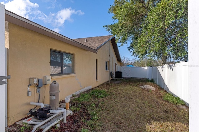 view of home's exterior featuring central AC unit