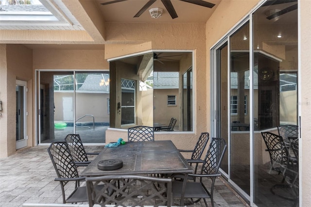 14101 Andrew Scott Rd, Spring Hill, FL 34609 - view of patio / terrace with ceiling fan and outdoor dining space