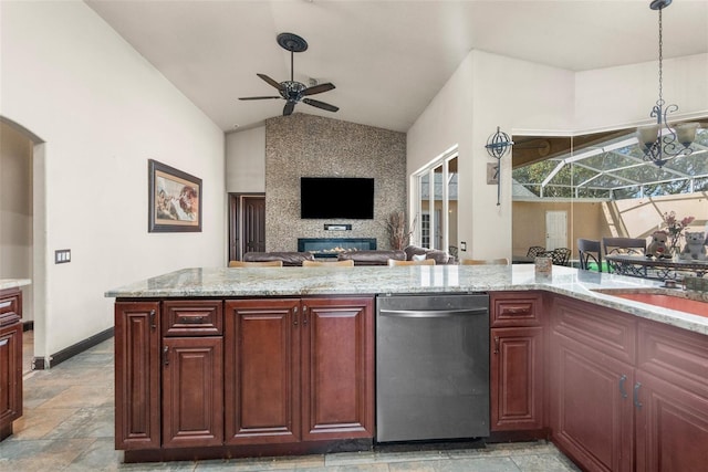 14101 Andrew Scott Rd, Spring Hill, FL 34609 - kitchen with dishwasher, vaulted ceiling, stone tile flooring, ceiling fan, and light stone countertops