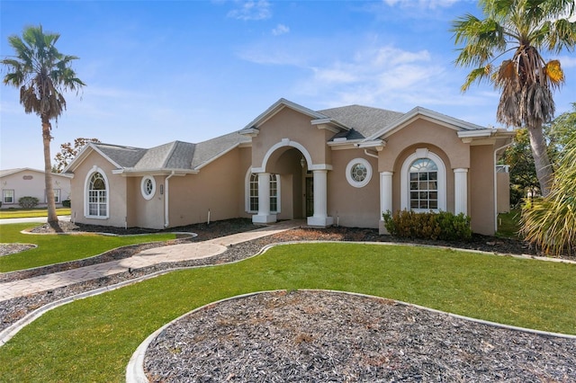 14101 Andrew Scott Rd, Spring Hill, FL 34609 - mediterranean / spanish house with stucco siding and a front yard