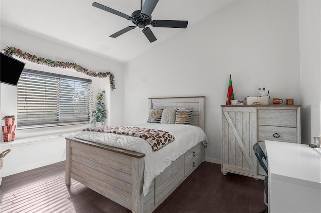 14101 Andrew Scott Rd, Spring Hill, FL 34609 - bedroom with vaulted ceiling, dark wood finished floors, and a ceiling fan