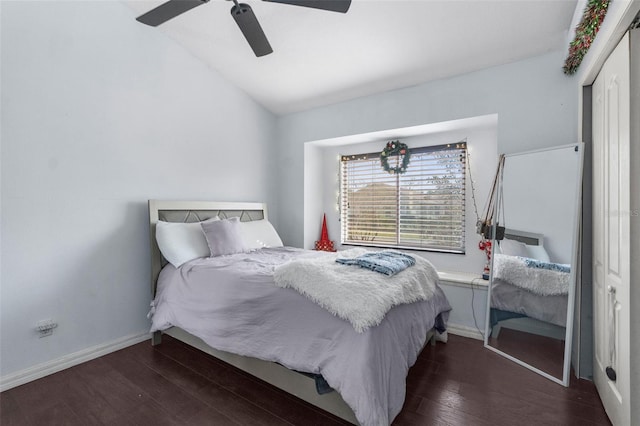 14101 Andrew Scott Rd, Spring Hill, FL 34609 - bedroom with wood finished floors, vaulted ceiling, and a ceiling fan