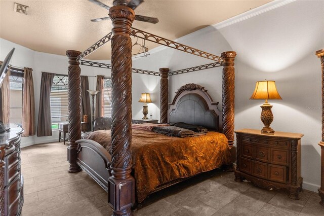 14101 Andrew Scott Rd, Spring Hill, FL 34609 - bedroom featuring crown molding, ceiling fan, and tile patterned floors