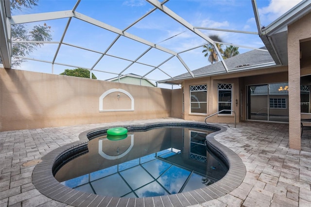 14101 Andrew Scott Rd, Spring Hill, FL 34609 - outdoor pool with a patio area and glass enclosure