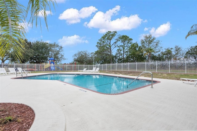 14101 Andrew Scott Rd, Spring Hill, FL 34609 - community pool featuring a patio