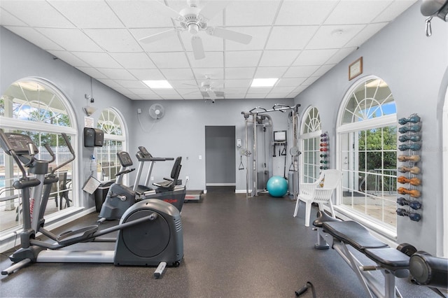 14101 Andrew Scott Rd, Spring Hill, FL 34609 - gym with ceiling fan, a paneled ceiling, and plenty of natural light
