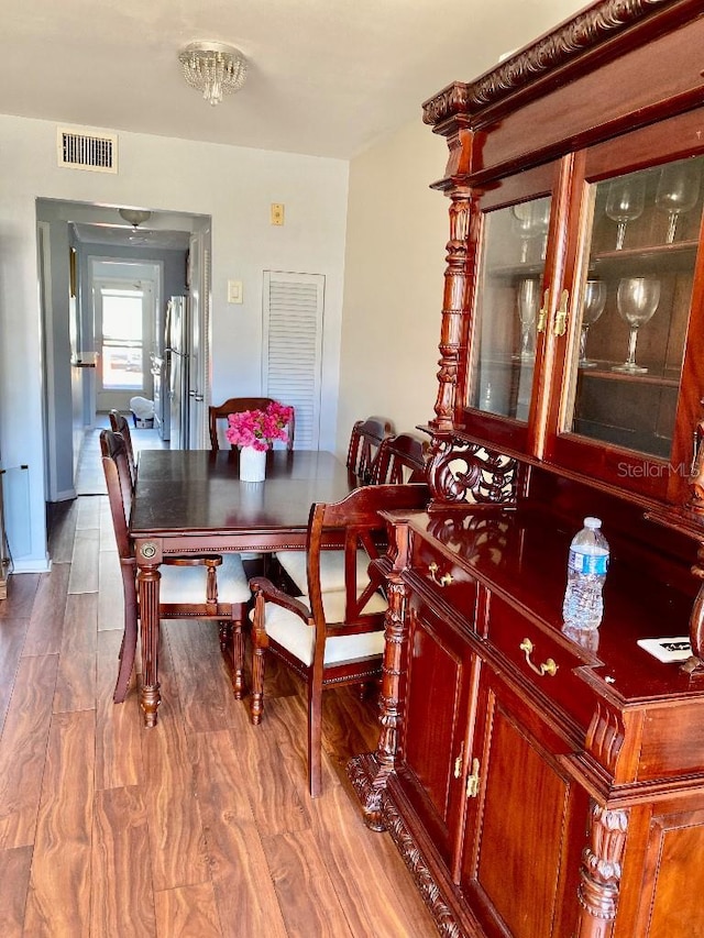 dining room featuring hardwood / wood-style flooring