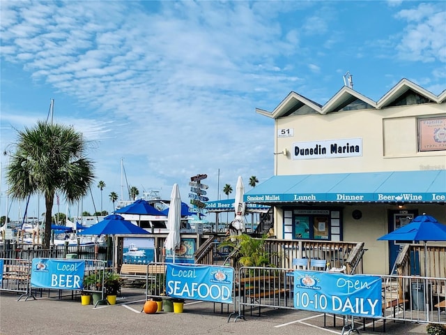 view of building exterior featuring fence