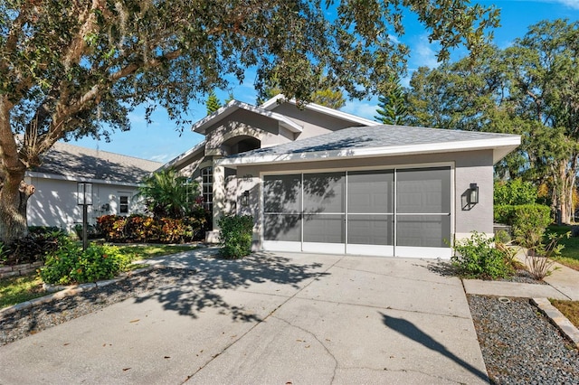 view of front of property with a garage