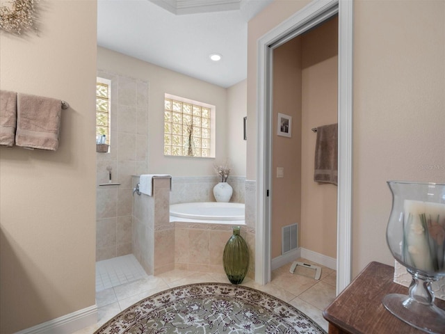 bathroom featuring tile patterned floors and plus walk in shower