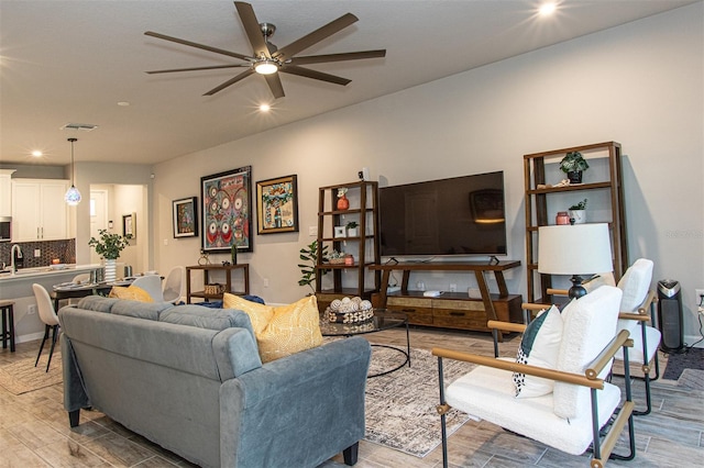 living room with ceiling fan