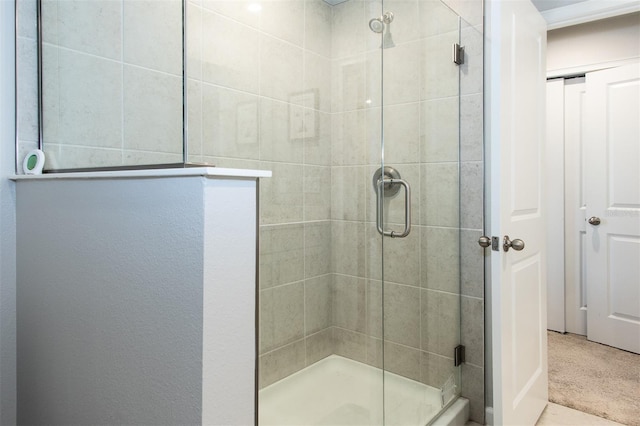 bathroom featuring an enclosed shower