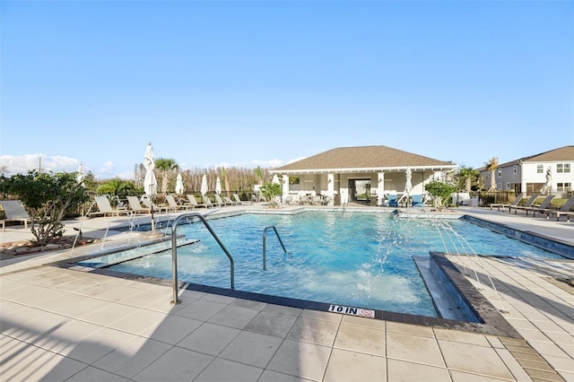 community pool featuring a patio area