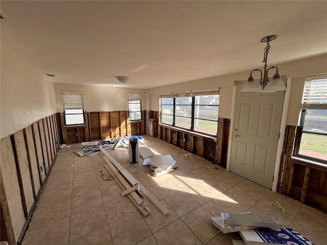 interior space featuring an inviting chandelier and a wealth of natural light